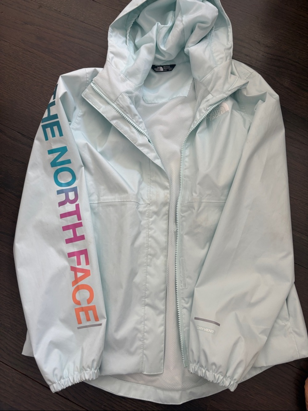 The North Face Mint Green Hooded Rain Shell with Gradient Sleeve Logo